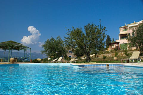 Property building, Day, Natural landscape, Swimming pool, sunbed