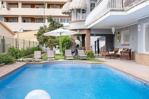 Property building, Living room, Swimming pool