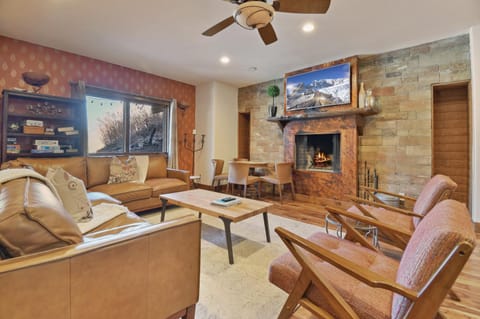TV and multimedia, Living room, Seating area, Mountain view, fireplace, furniture