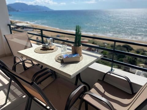 Day, View (from property/room), View (from property/room), Balcony/Terrace, Balcony/Terrace, Decorative detail, Seating area, Dining area, Beach, Landmark view, Landmark view, Mountain view, Sea view, Sea view, Time of day, Family, Family, furniture