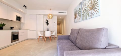 Kitchen or kitchenette, Living room, Seating area, air conditioner