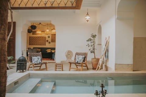 Property building, Living room, Swimming pool
