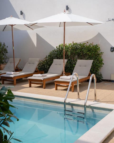Patio, Day, Pool view, Swimming pool, sunbed