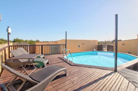 Property building, Living room, Swimming pool