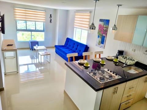 Kitchen or kitchenette, Living room, Seating area, Dining area