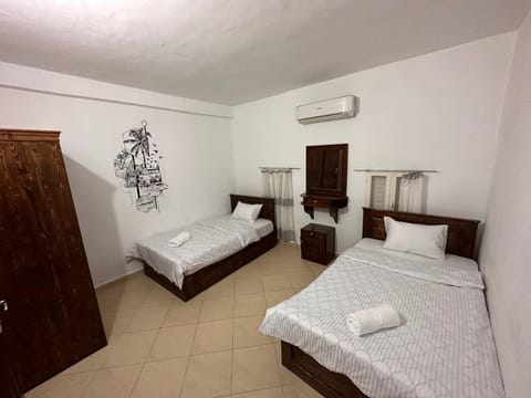 Bed, Photo of the whole room, Bedroom, towels, air conditioner