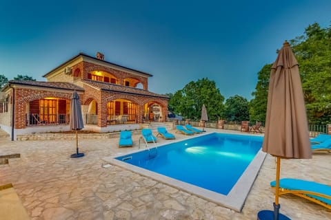 Property building, Patio, Balcony/Terrace, Swimming pool, Sunset