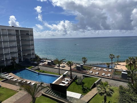Property building, Communal lounge/ TV room, Natural landscape, Beach, Pool view, Sea view, Swimming pool, Swimming pool, sunbed