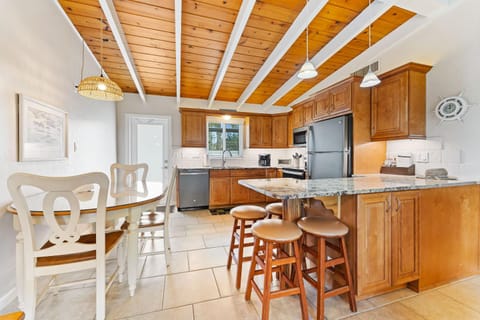 Kitchen or kitchenette, dishwasher, oven, stove