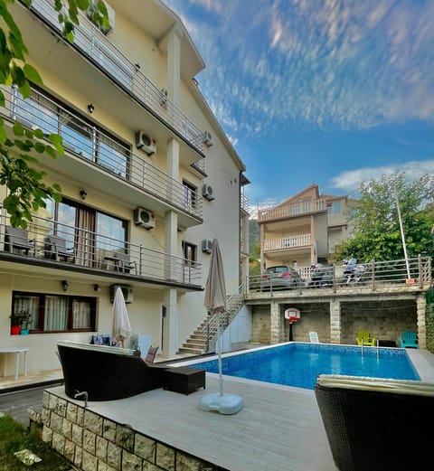 Property building, Patio, Day, View (from property/room), Balcony/Terrace, Pool view, Swimming pool, sunbed
