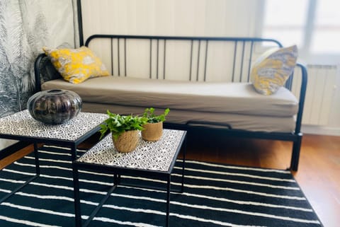 Bed, Living room, Seating area, Bedroom