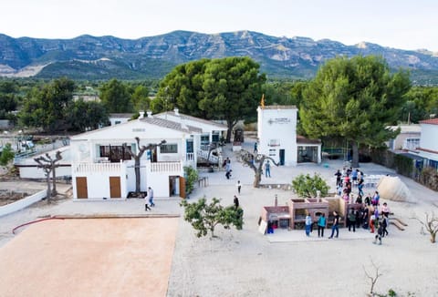 Property building, People, Natural landscape, Bird's eye view