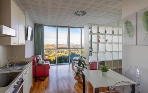 Kitchen or kitchenette, Living room, Seating area, Dining area