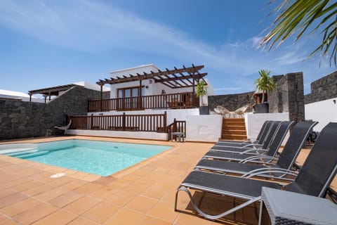 Property building, Living room, Swimming pool