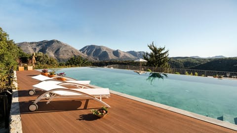 Nearby landmark, Day, Natural landscape, Mountain view, Pool view, Swimming pool, sunbed