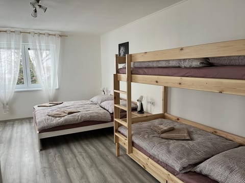 Bed, Photo of the whole room, Bedroom, bunk bed, towels
