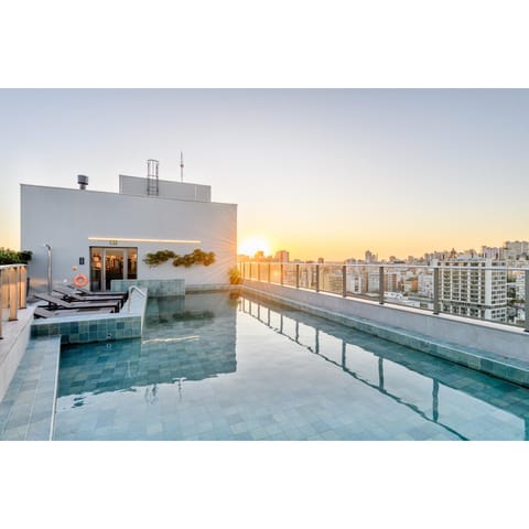 Property building, Day, Pool view, Swimming pool, Sunrise
