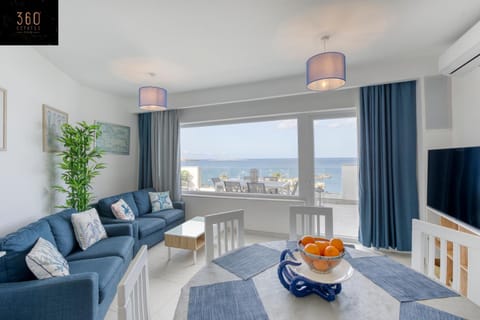 Natural landscape, Living room, Seating area, Dining area, Sea view