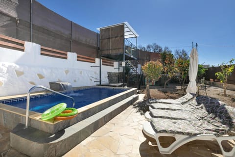 Property building, Living room, Swimming pool