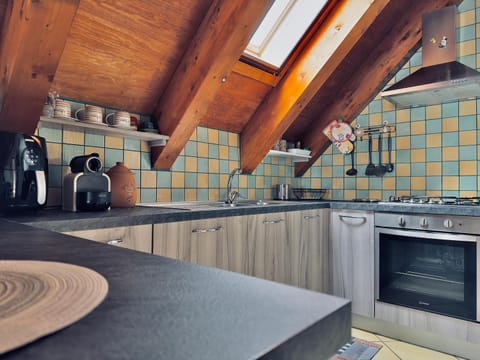 Kitchen or kitchenette, stove