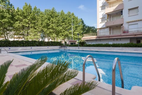 Property building, Living room, Swimming pool