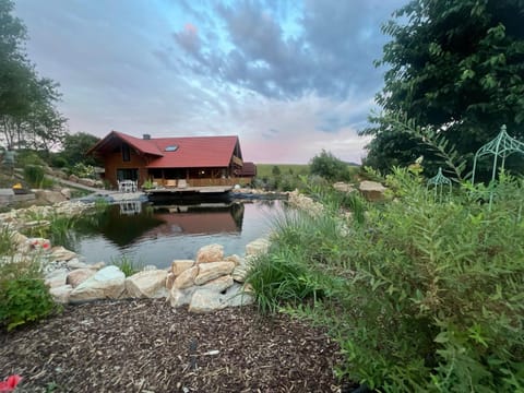 Property building, Day, Natural landscape, Lake view, Swimming pool