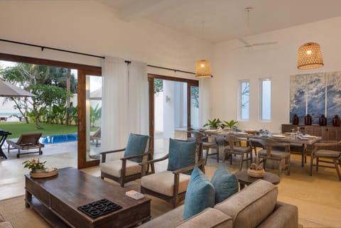 Living room, Seating area, Pool view