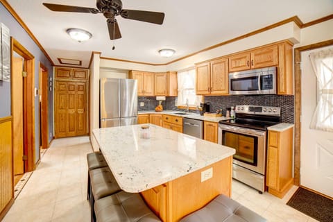 Waterfront Evart House on Chippewa Lake Channel House in Michigan