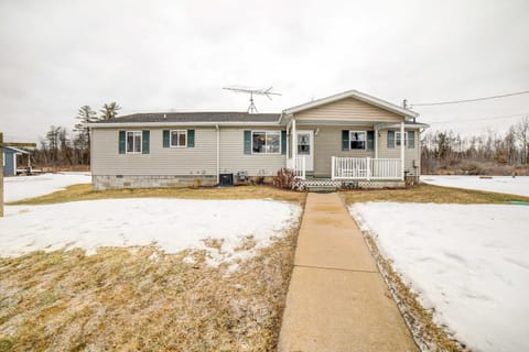 Waterfront Evart House on Chippewa Lake Channel House in Michigan