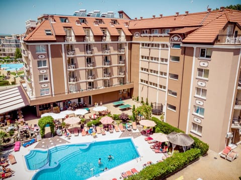 Property building, Patio, Pool view, Swimming pool, sunbed
