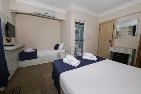 Bed, Photo of the whole room, towels, wardrobe, air conditioner