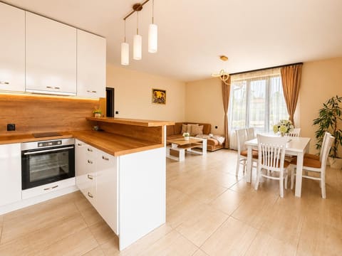 Property building, Restaurant/places to eat, Kitchen or kitchenette, Living room, kitchen