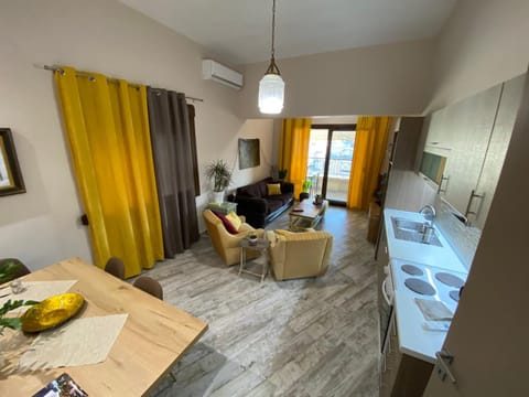 Kitchen or kitchenette, Living room, Seating area, Dining area