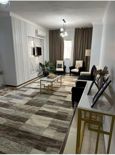 TV and multimedia, Living room, Seating area, fireplace, air conditioner