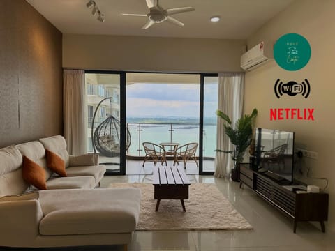 TV and multimedia, Living room, Seating area, Sea view, air conditioner