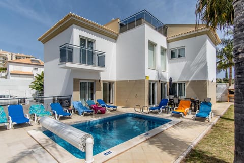 Property building, Living room, Swimming pool