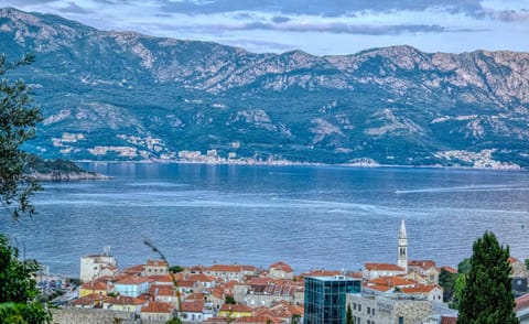 Nearby landmark, Day, Natural landscape, City view, Mountain view, Sea view, Time of day, Sunrise, Sunset