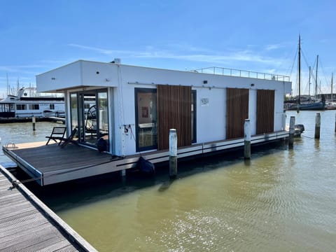 Property building, Day, Natural landscape, Lake view, River view