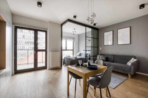 Bed, Living room, Seating area, Dining area
