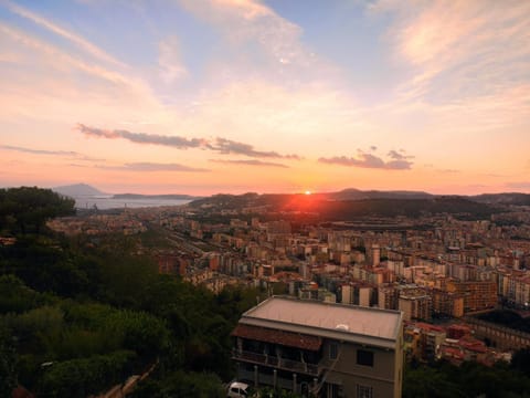 Property building, Natural landscape, City view, Sea view, Sunset