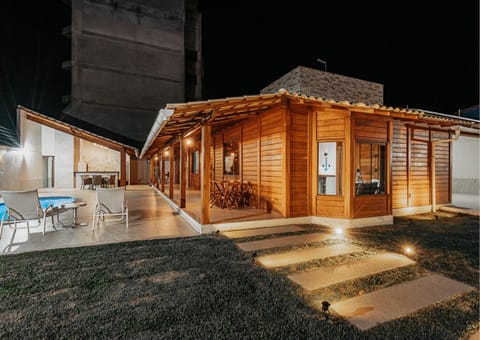 Property building, Patio, Night, BBQ facilities, Swimming pool