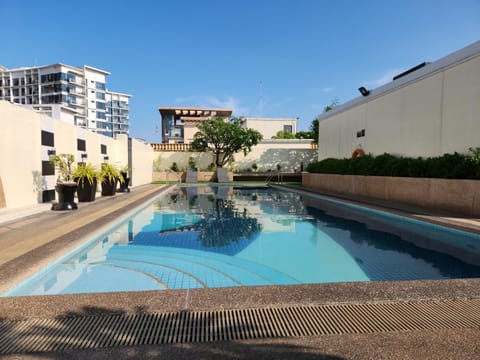 Property building, Day, Pool view, Swimming pool