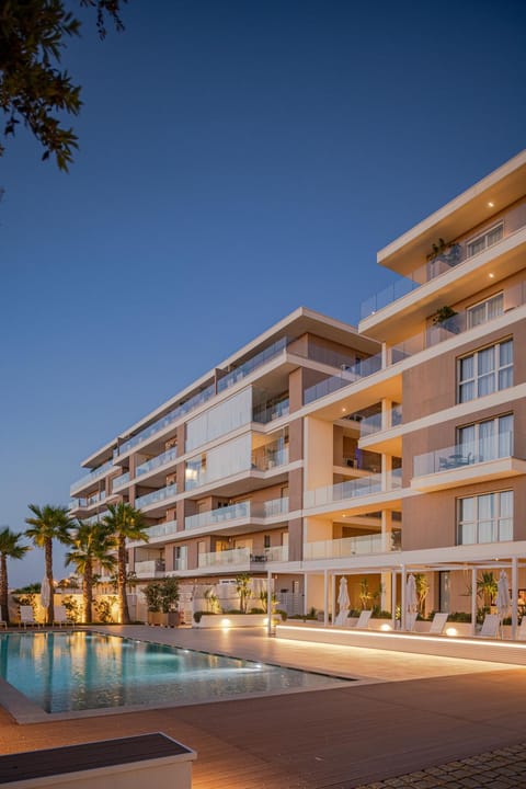 Property building, Pool view, Swimming pool, sunbed