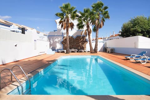 Property building, Living room, Swimming pool