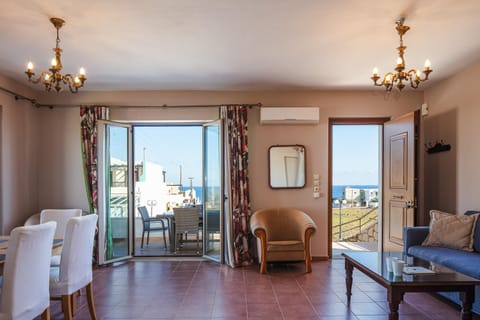 View (from property/room), Balcony/Terrace, Living room, Seating area, Dining area, air conditioner