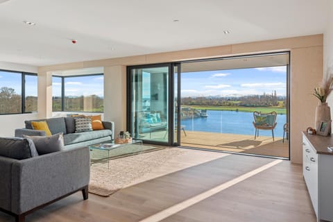 View (from property/room), Balcony/Terrace, Living room, Seating area, Lake view