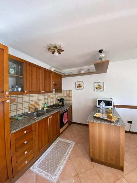 Kitchen or kitchenette, microwave, oven