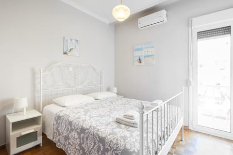 Bed, Photo of the whole room, Bedroom, towels, air conditioner