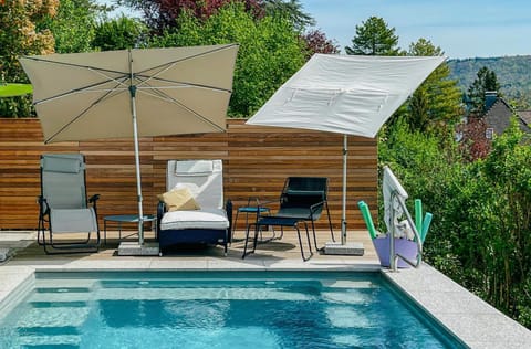 Property building, Living room, Swimming pool