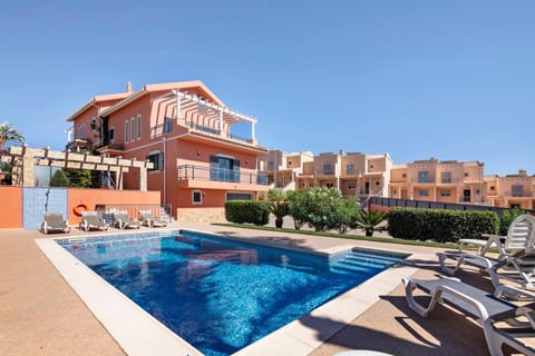 Property building, Living room, Swimming pool